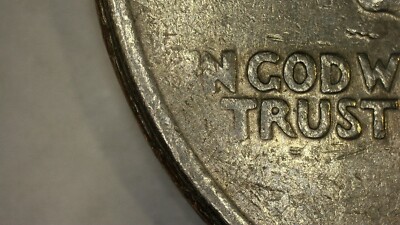1986-P Kennedy half dollar Struck-Through Grease error showing missing or faint date digit